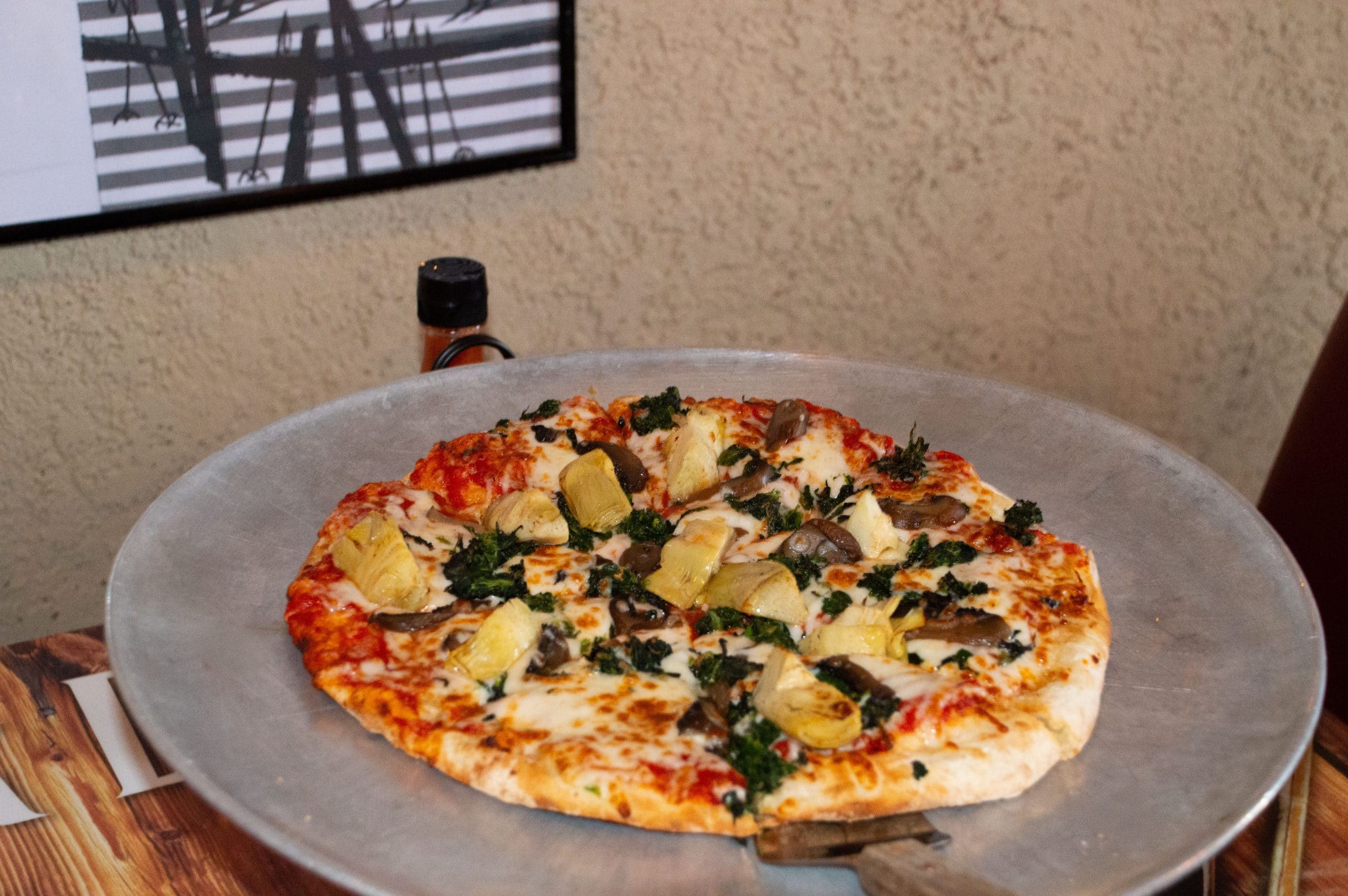 SPINACH, MUSHROOM, AND ARTICHOKE PIZZA